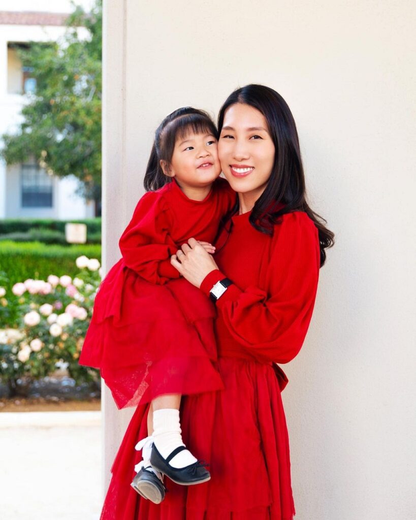 Chris Han with her daughter
